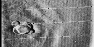 Mariner 9 views Olympus Mons standing above the Martian Dust Storm.