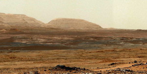 The component images were taken between 11:39 and 11:43 a.m., local solar time, on 343rd Martian day, or sol, of the rover's work on Mars (July 24, 2013). A rise topped by two gray rocks near the center of the scene is informally named Twin Cairns Island. It is about 100 feet (30 meters) from Curiosity's position.