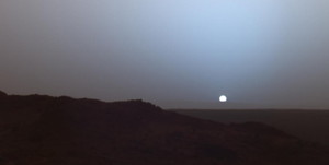 On May 19th, 2005, NASA's Mars Exploration Rover Spirit captured this stunning view as the Sun sank below the rim of Gusev crater on Mars. This Panoramic Camera mosaic was taken around 6:07 in the evening of the rover's 489th martian day, or sol. Spirit was commanded to stay awake briefly after sending that sol's data to the Mars Odyssey orbiter just before sunset. The image is a false color composite, showing the sky similar to what a human would see, but with the colors slightly exaggerated. (NASA/JPL/Texas A&M/Cornell).