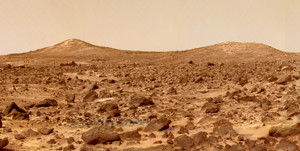 The Twin Peaks are modest-size hills to the southwest of the Mars Pathfinder landing site. They were discovered on the first panoramas taken by the IMP camera on the 4th of July, 1997.The peaks are approximately 30-35 meters (-100 feet) tall. North Twin is approximately 860 meters (2800 feet) from the lander, and South Twin is about a kilometer away (3300 feet). The scene includes bouldery ridges and swales or hummocks of flood debris that range from a few tens of meters away from the lander to the distance of the South Twin Peak.