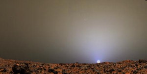 This illustration is a composite that creatively combines two previously released images from Mars Pathfinder for a sunset scene in Ares Valles in July 1997. The sky image is a radiometrically correct, true-color sunset, with the sky near the Sun a pale blue color. The terrain image has been artistically adjusted to match the approximate time of day of the sky image (4:10 p.m. local solar time at the landing site) and to provide a seamless horizon. The two source images are composites of several frames from the Imager for Mars Pathfinder camera.